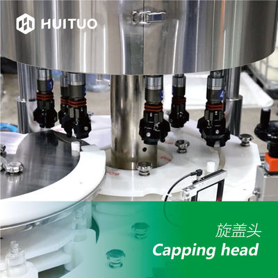 Automatische mit einer Kappe bedeckende Maschine Huituo 7200bph für rundes Kappe Babyöl